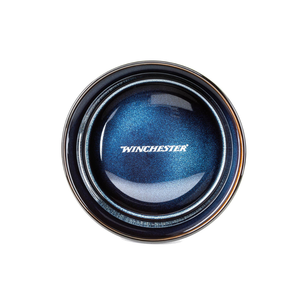 Blue Winchester jar lid on a white background