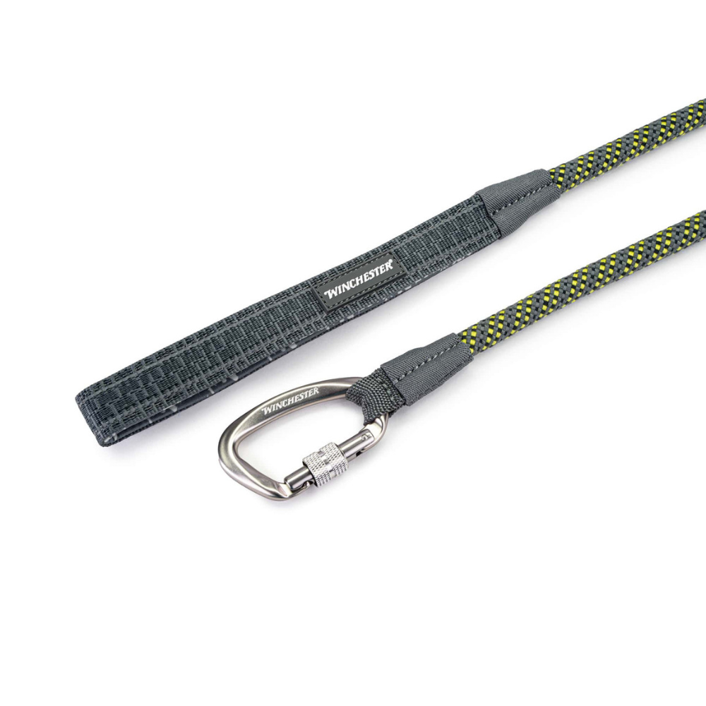 Dog leash with carabiner and textured gray handle on a white background