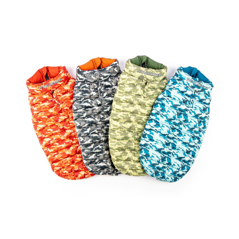 Four camouflage-patterned Dog vests in different colors on a white background
