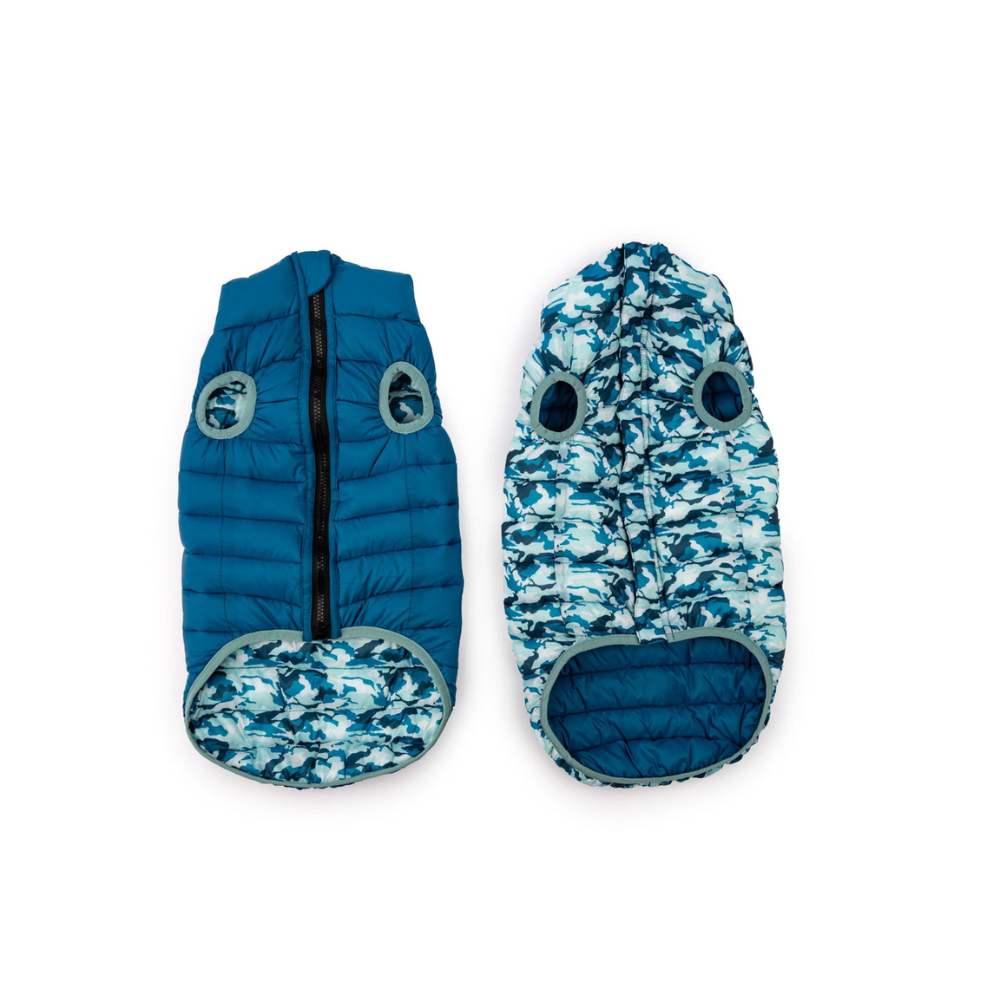 Two blue pet coats with camouflage patterns on a white background